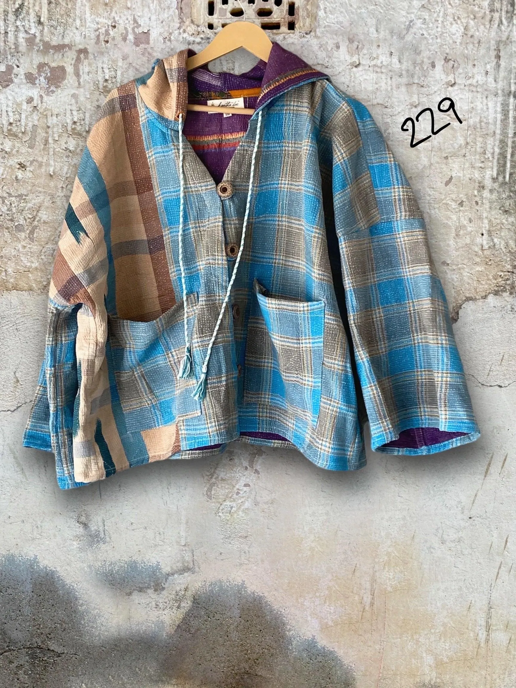 Half Moon Cropped Hooded Jacket by Kantha Bae