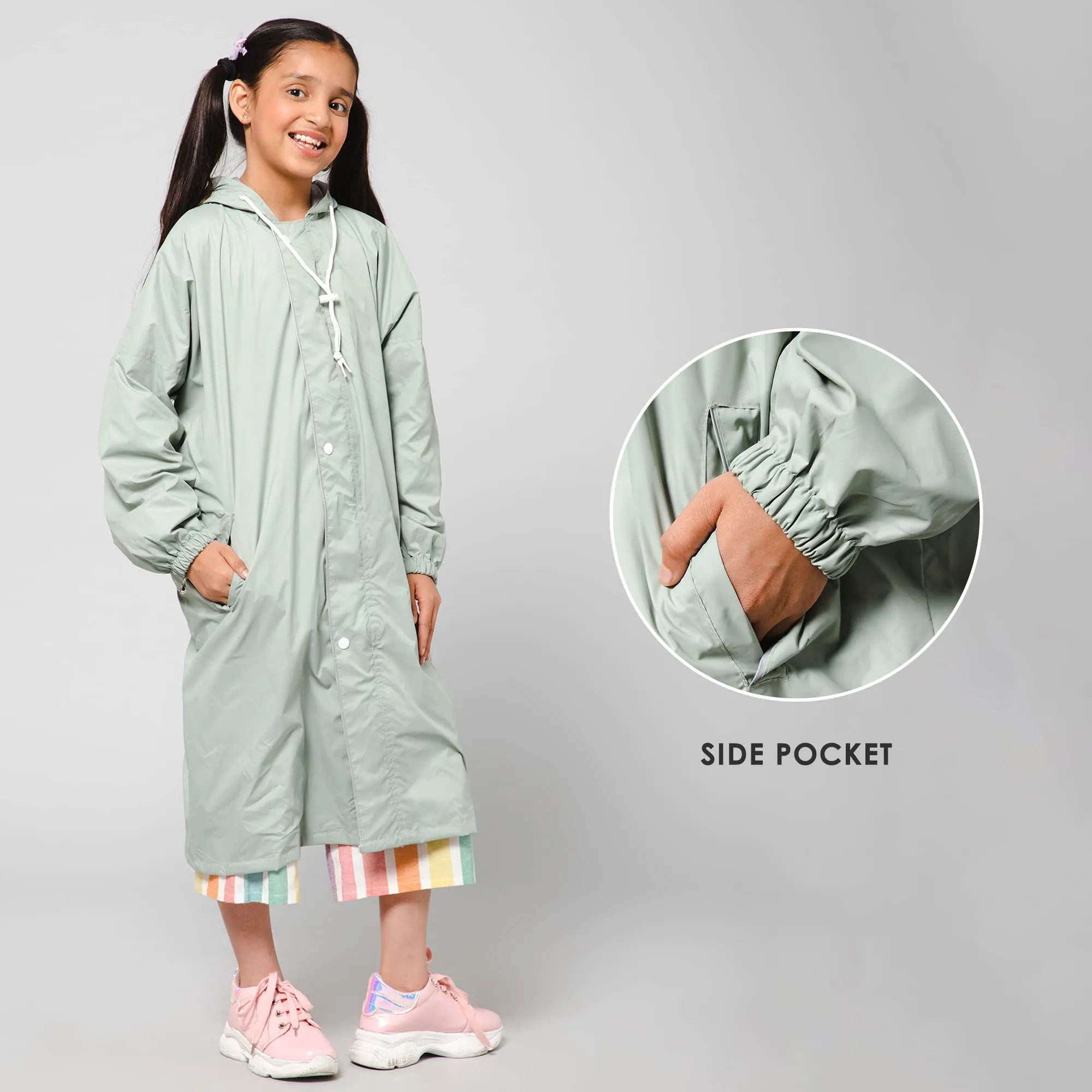 THE CLOWNFISH Cloud Chaser Series Kids Raincoat Waterproof Polyester Double Coating Reversible Longcoat with Hood and Reflector Logo at Back. Printed Plastic Pouch. Kid Age-11-12 years (Pista Green)