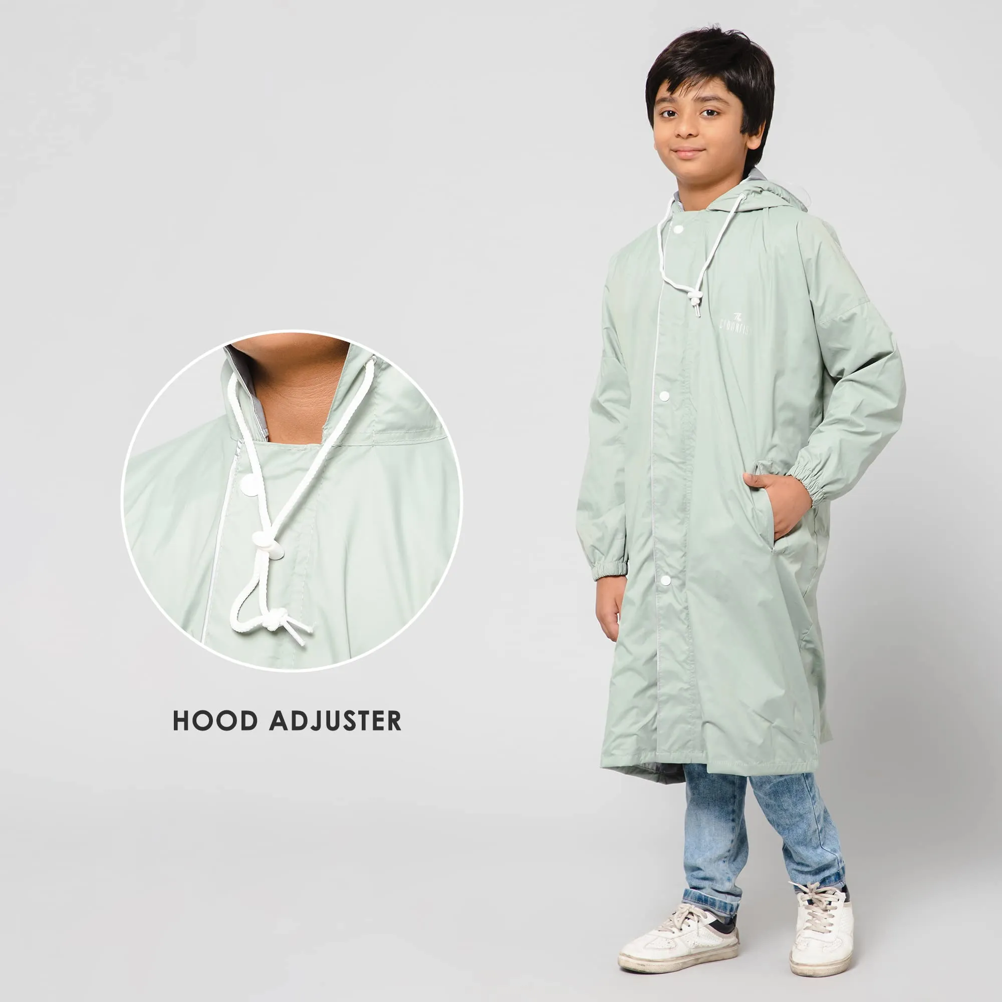 THE CLOWNFISH Cloud Chaser Series Kids Raincoat Waterproof Polyester Double Coating Reversible Longcoat with Hood and Reflector Logo at Back. Printed Plastic Pouch. Kid Age-11-12 years (Pista Green)