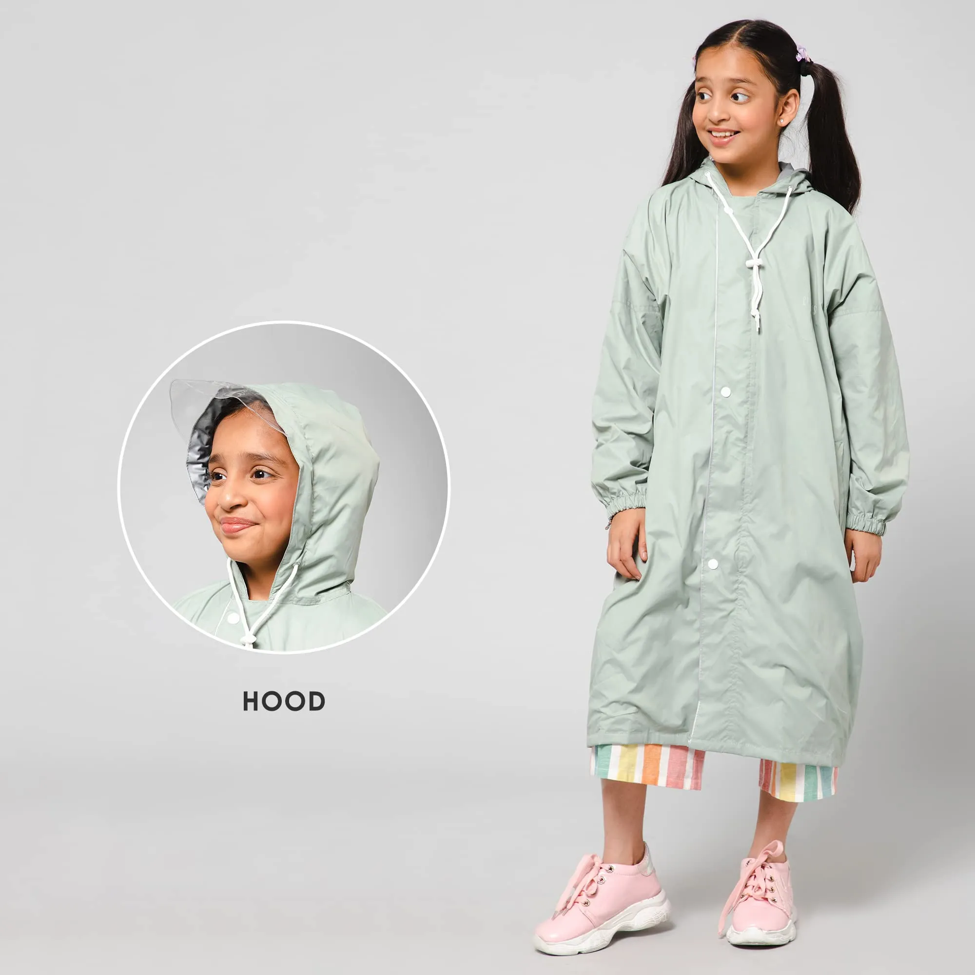 THE CLOWNFISH Cloud Chaser Series Kids Raincoat Waterproof Polyester Double Coating Reversible Longcoat with Hood and Reflector Logo at Back. Printed Plastic Pouch. Kid Age-11-12 years (Pista Green)