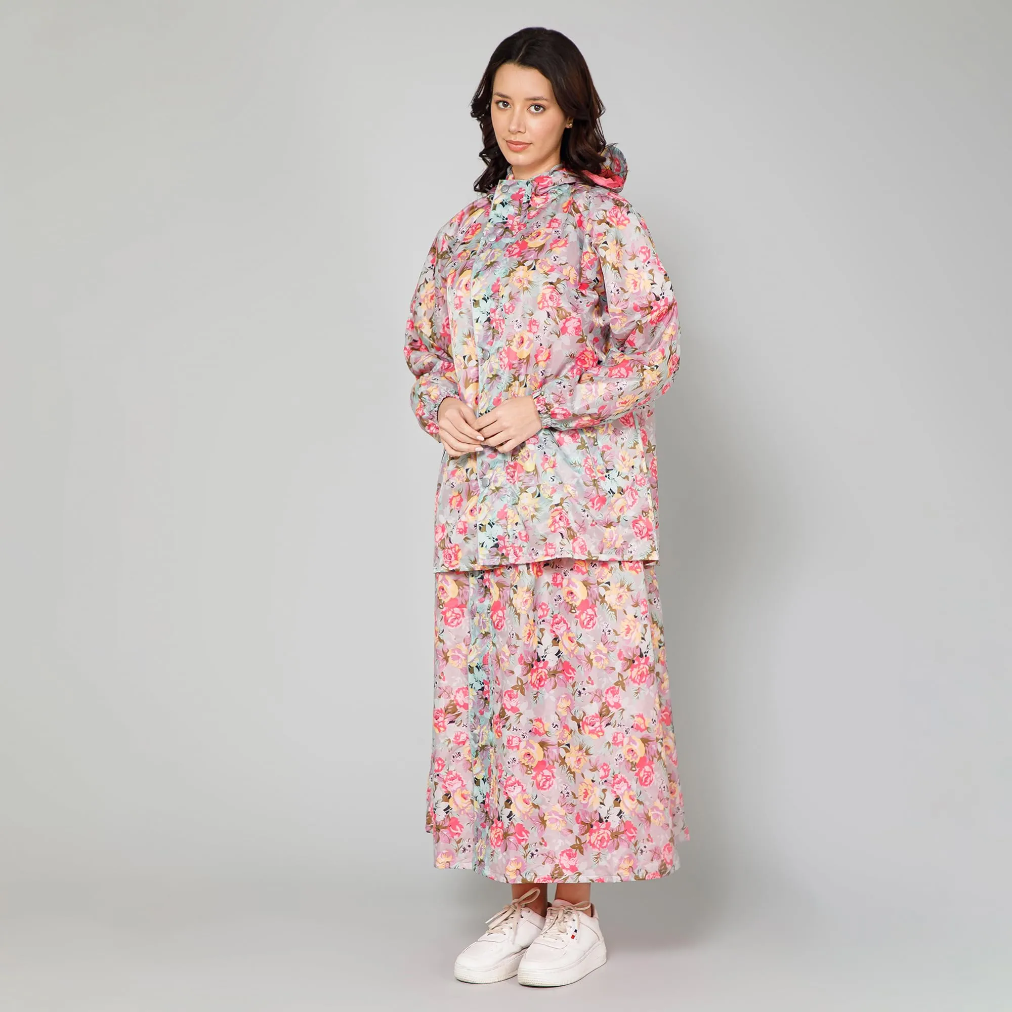 THE CLOWNFISH Polyester Waterproof Rain Coat For Women Skirt and Top Raincoat With Adjustable Hood and Front Pockets Rain Glam Series (Multicolour Floral, XX-Large)