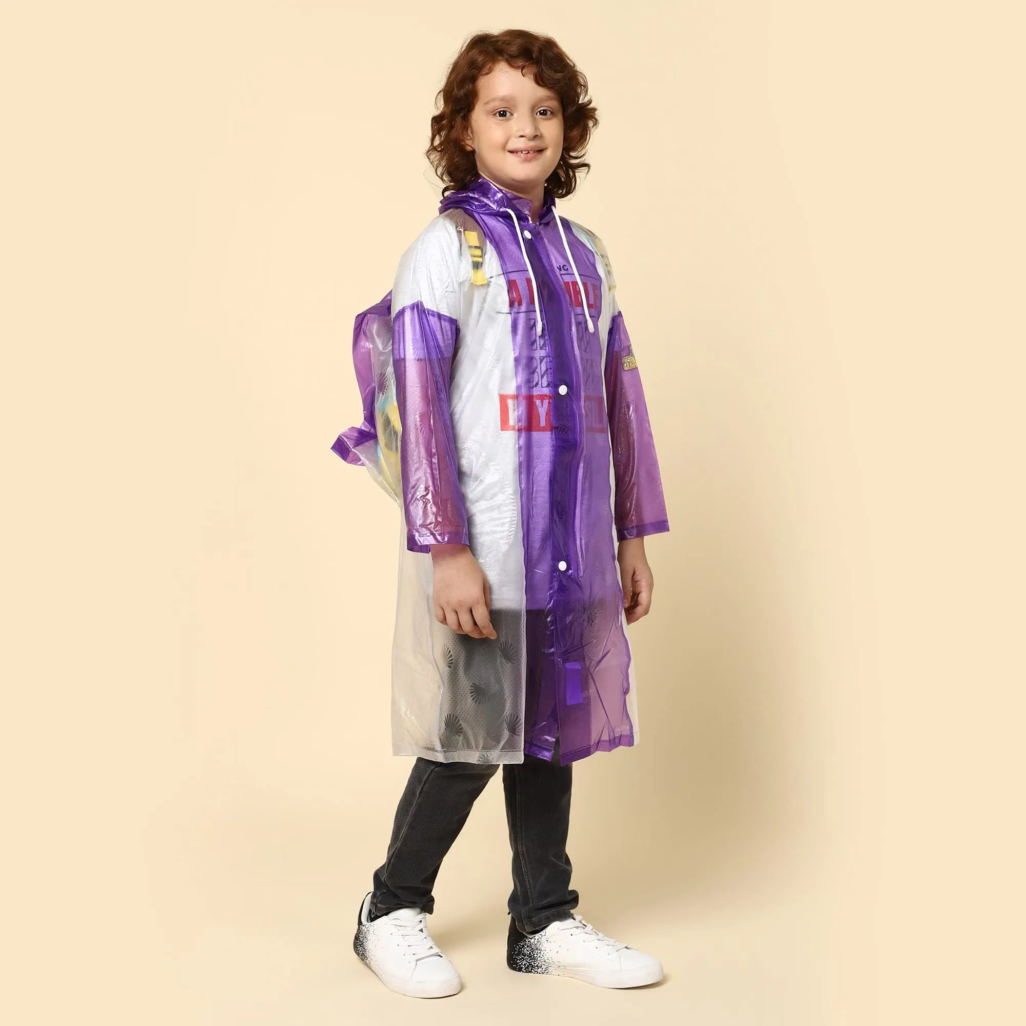 THE CLOWNFISH Simpson Series Kids Waterproof PVC Longcoat with Adjustable Hood & Extra Space for Backpack/Schoolbag Holding. Printed Plastic Pouch. Kid Age-9-10 years (Size-36-Purple)