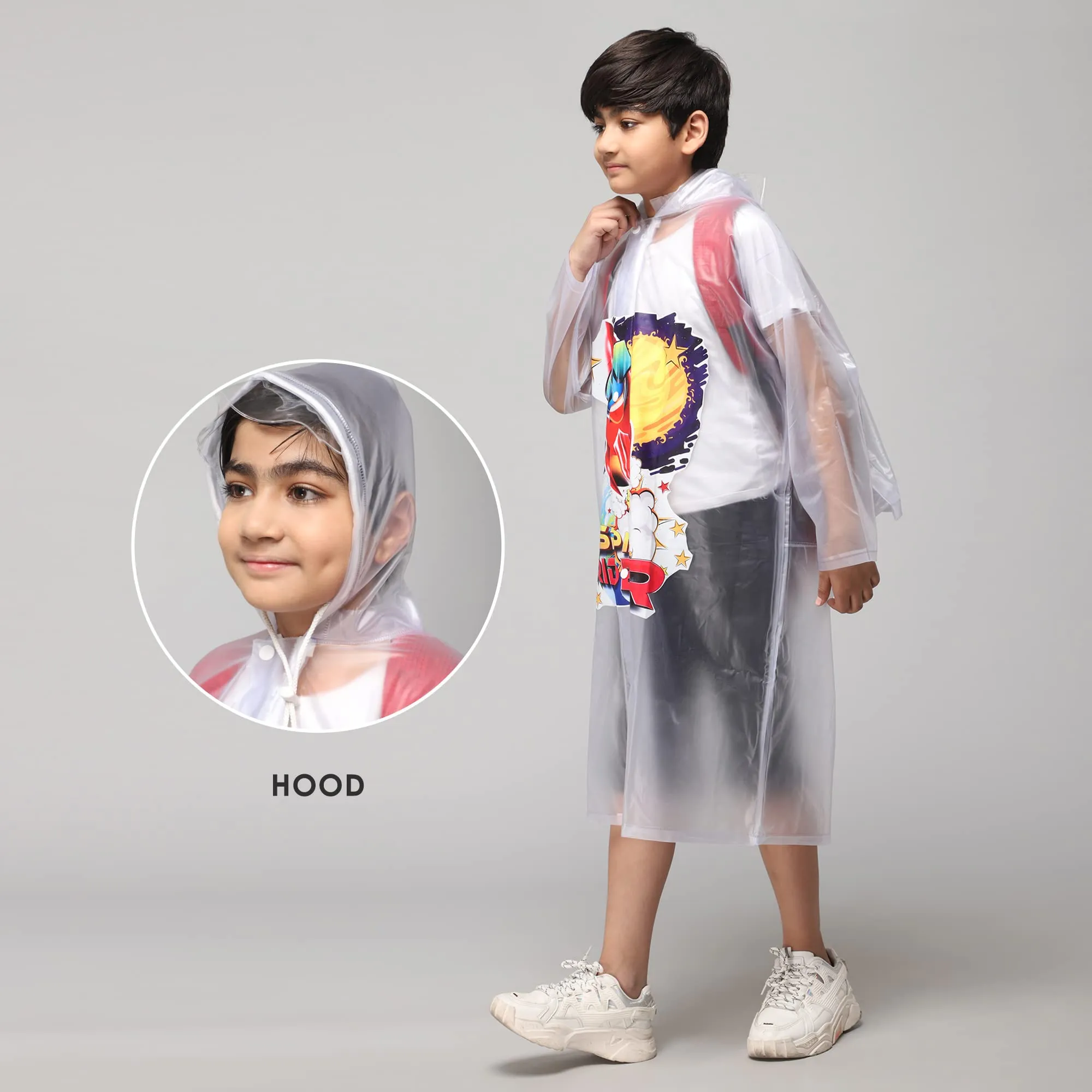 THE CLOWNFISH Toon Caper Series Kids Waterproof PVC Longcoat with Adjustable Hood & Extra Space for Backpack/Schoolbag Holding. Printed Plastic Pouch. Kid Age-4-5 years (Link White-Transparent)